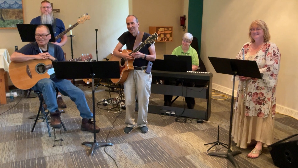 A group of musicians demonstrates ensemble instrument sound ranges