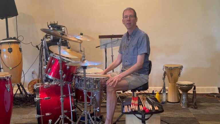 Brian Malone demonstrates techniques for using a drum set in liturgical settings
