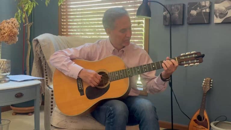 Video screenshot of Steve Petrunak playing guitar in this video about managing performance anxiety