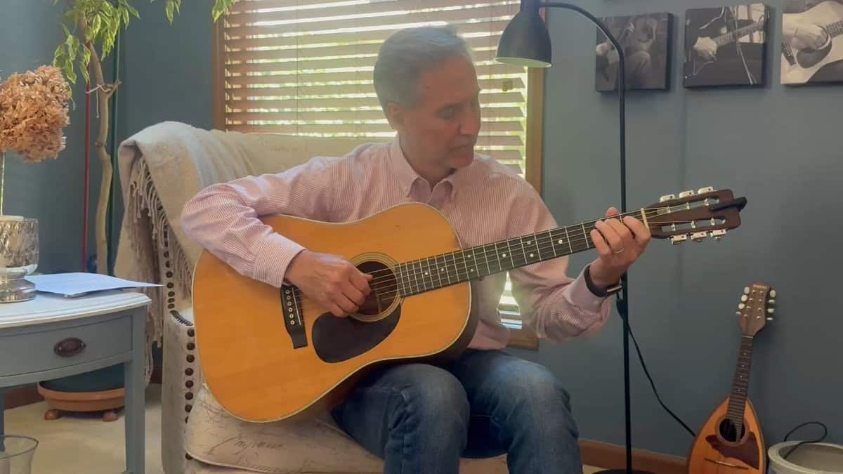 Video screenshot of Steve Petrunak playing guitar in this video about managing performance anxiety