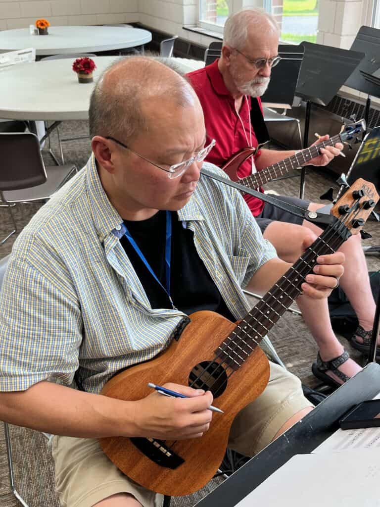 Ensemble musician practicing instrumental technique during CLEF mal training