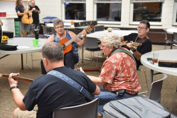 Small group discussion during a liturgical music conference at CLEF