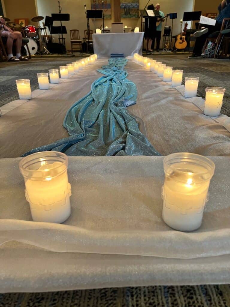 Prayerful liturgical space prepared for a Catholic music program supporting ensemble musicians and liturgical music formation