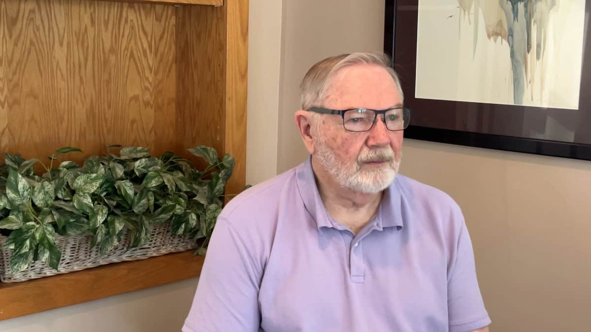 Photo of Fr. Roc O'Connor being interviewed about his journey in music ministry