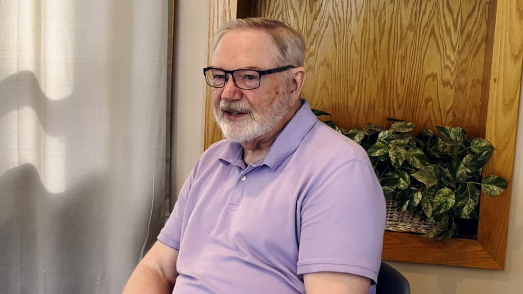 Photo of Fr. Roc O'Connor being interviewed about his journey in music ministry