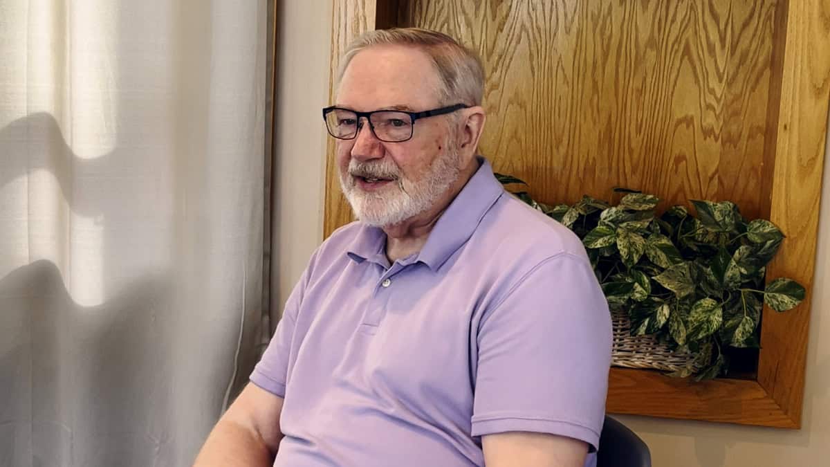 Photo of Fr. Roc O'Connor being interviewed about his journey in music ministry