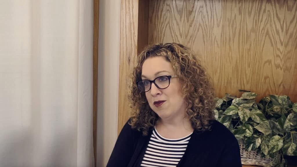 Photo of Katie Barton talking about her journey in music ministry