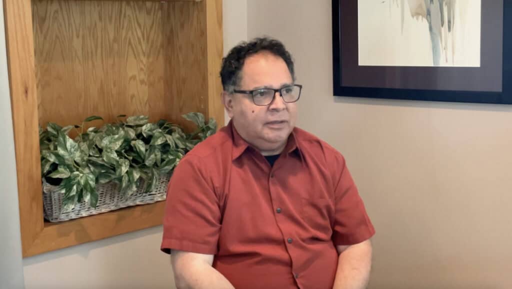 Photo of Jaime Cortez from a video talking about his music ministry journey