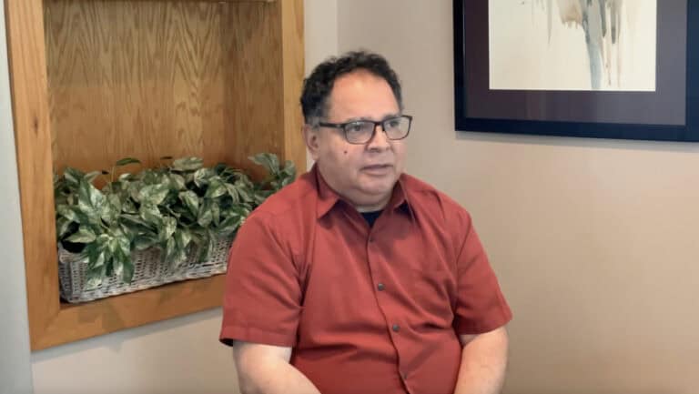 Photo of Jaime Cortez from a video talking about his music ministry journey