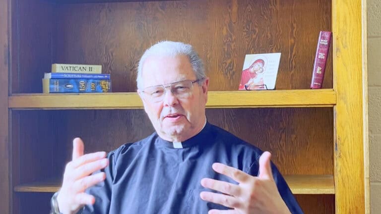 Photo of Fr. Randy Phillips discussing the Solemnity of All Saints